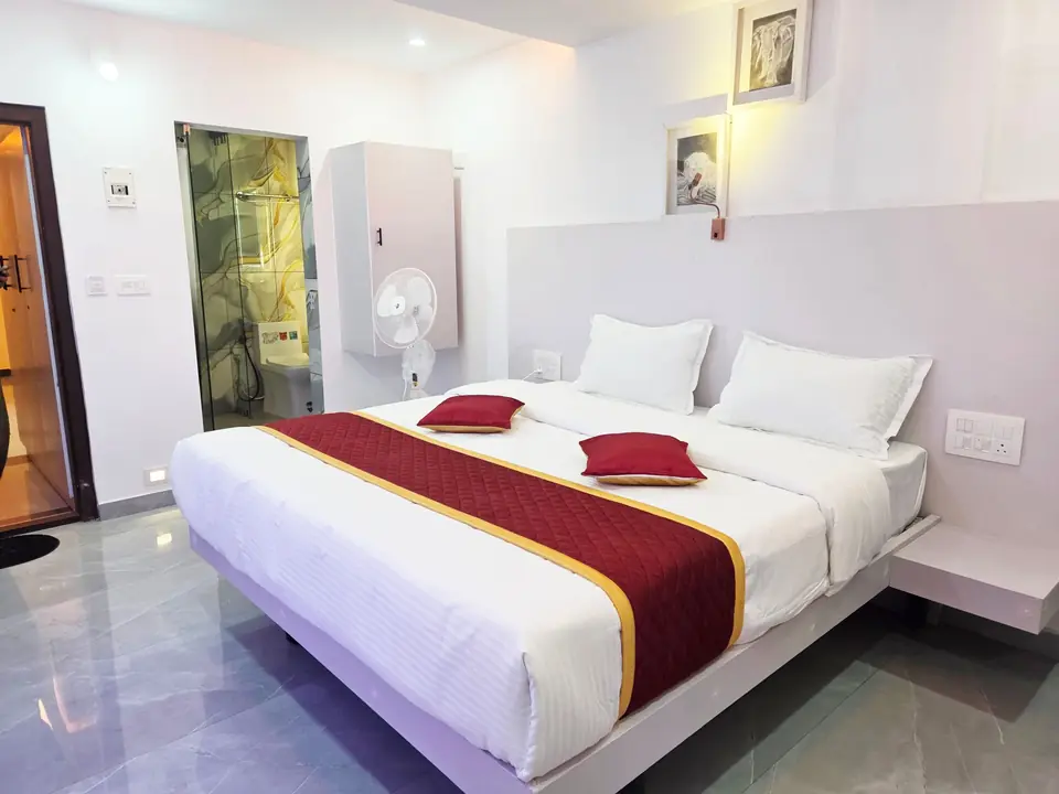 Family Room at Tazinn Stay with glass shower room and wardrobe
